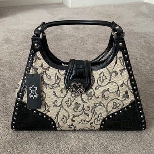 M.C. Purse. White with Black design and black leather trim